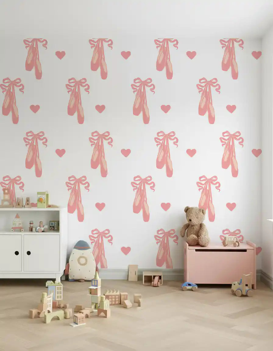 Scattered hearts and ballet shoes wallpaper forming a gentle pastel pattern in playroom.