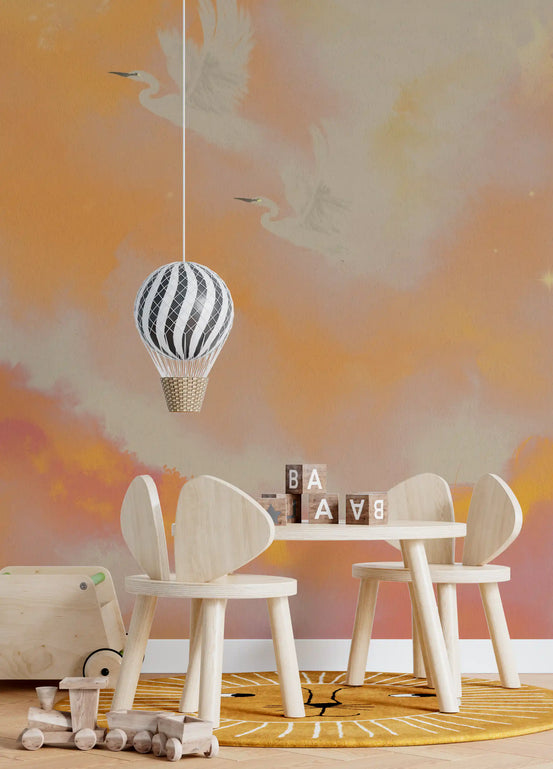Soft peach sky with flying white cranes wall mural for kids nursery area., GD10144