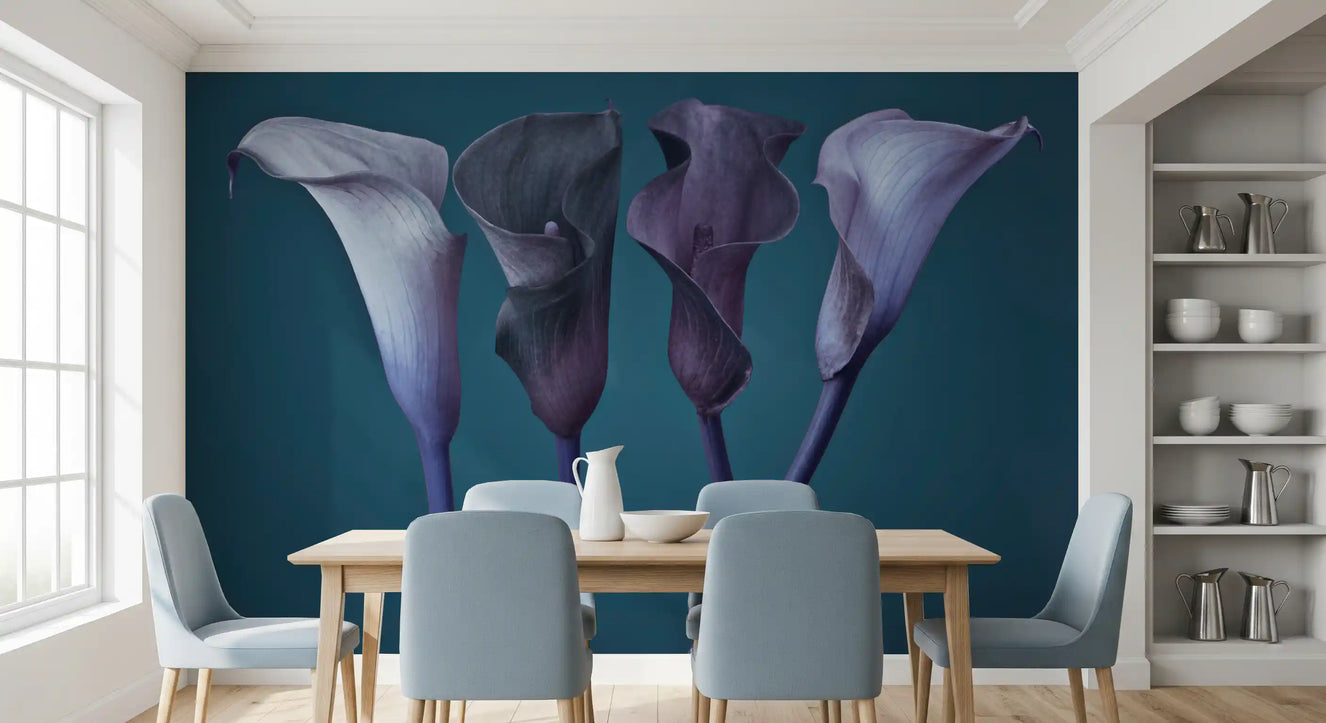 Calla lily wall mural with four blooms in silver, lavender, plum and charcoal on a deep blue background.