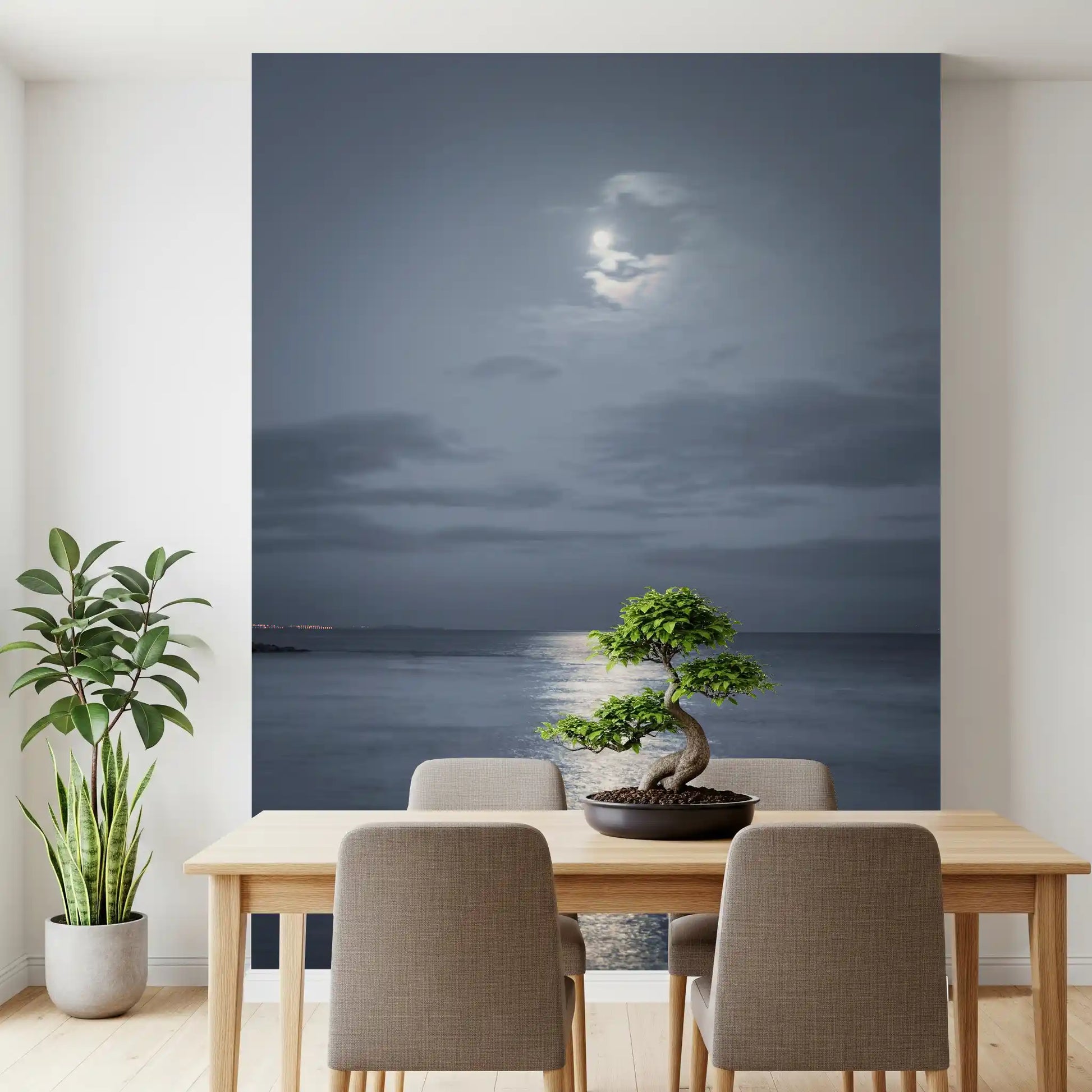 Wide seascape mural with soft clouds drifting over a dark blue ocean.