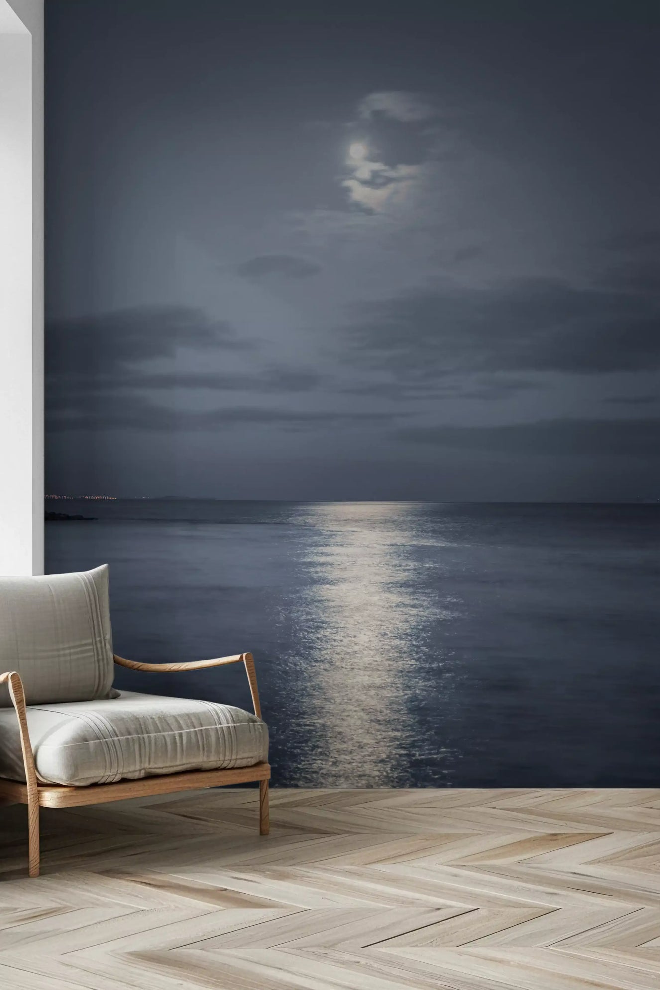 Moonlit ocean wall mural with a full moon above calm blue water in hallway.