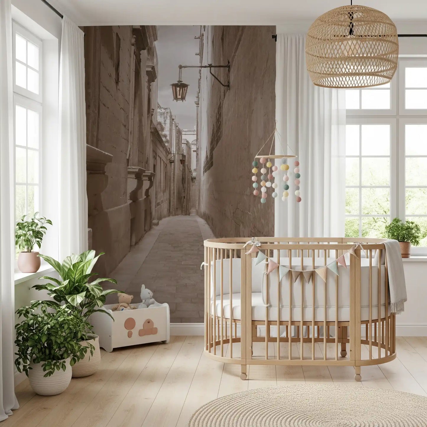 Wrought-iron lantern hanging from a bracket on a tall weathered stone wall mural for nursery.
