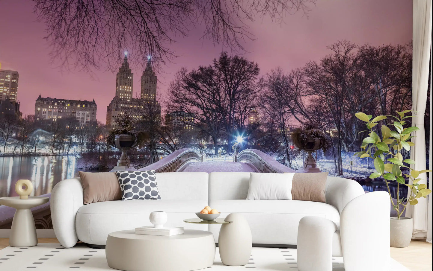 ow Bridge wall mural showing snowy Central Park at winter dusk under a pink sky in living room.
