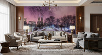 Snowy Central Park city mural across a living room accent wall at dusk. 
