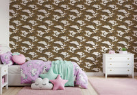 Golden leopard wallpaper on a child's bedroom wall showing tan cats over a cream base., GD10165