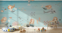 Mermaid wall mural with watercolour mermaids and a grey dolphin over calm aqua water., GD10169