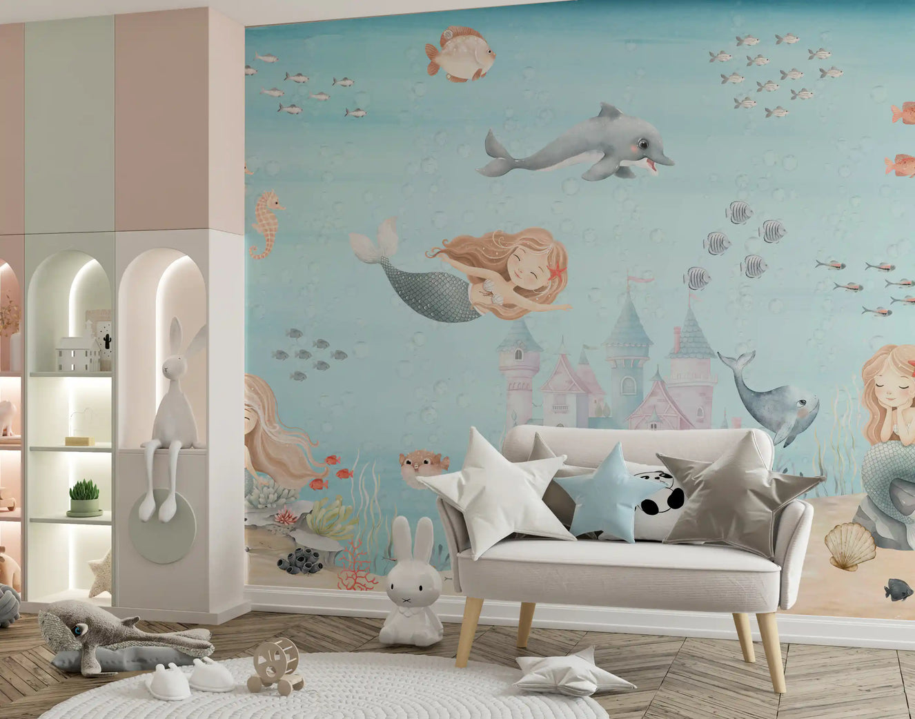 Mermaid wall mural with three mermaids around a pastel underwater castle.