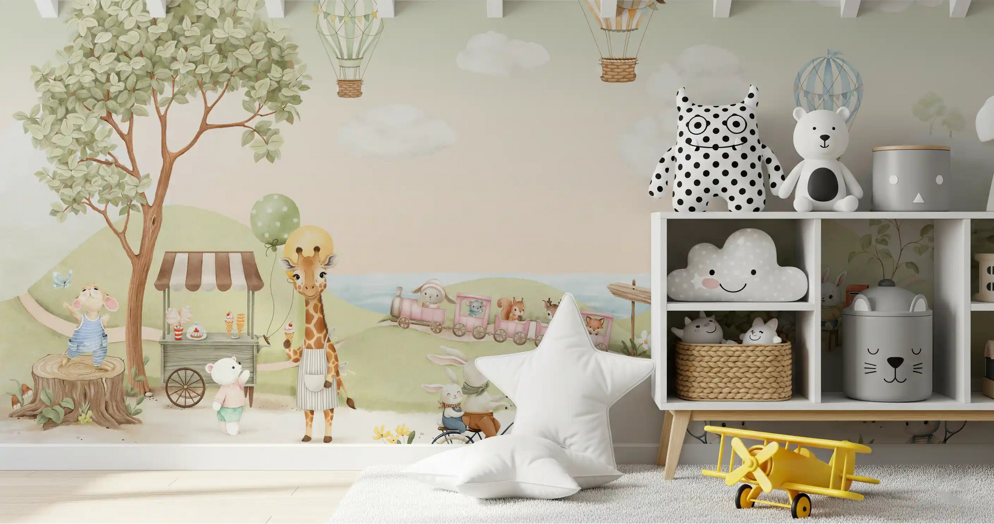Animal wall mural with a giraffe, bunnies, and pastel hot air balloons over green hills for nursery., GD10174
