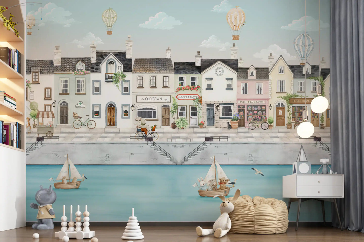 Pale blue sky wall mural with gentle clouds and balloons above old town houses., GD10178