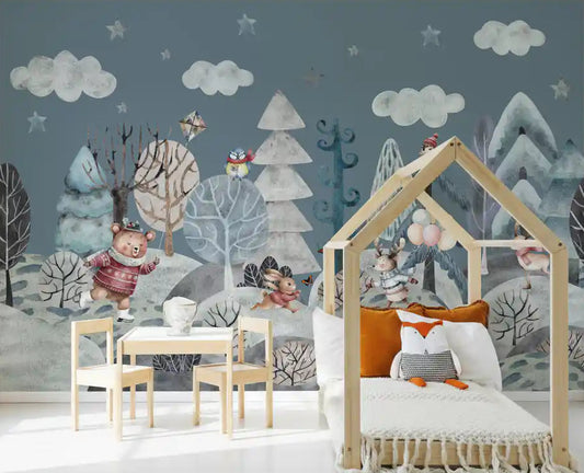 Forest friends winter mural covering a toddler room feature wall.