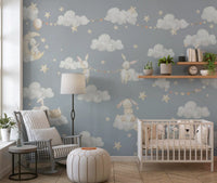 Scattered cream stars on a muted blue-grey sky wall mural., GD10189