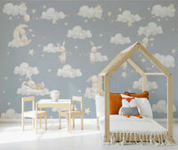 Dreamy bunnies and clouds mural covering a toddler room feature wall, GD10189