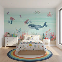 Underwater ocean mural in a bedroom with mermaids, a whale and coral., GD10191