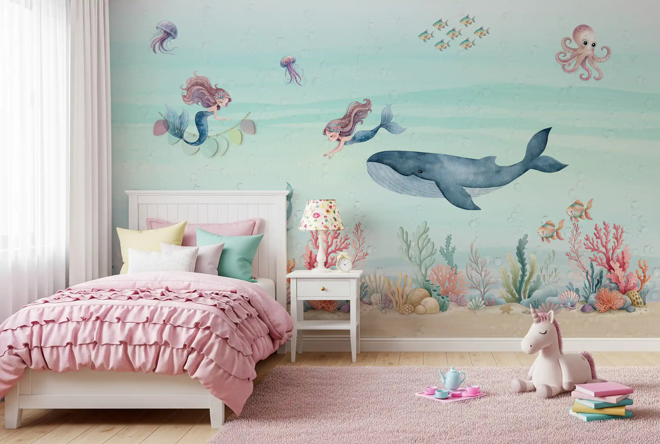 Watercolor underwater mural showing a pink narwhal near a coral reef.