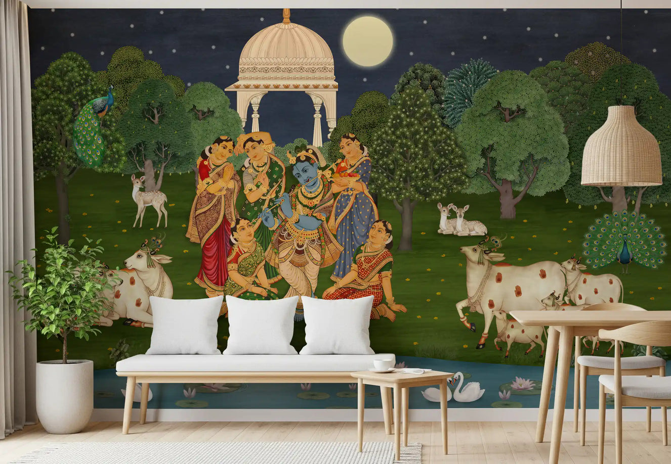 Pichwai mural across a living room accent wall in deep blue and green tones.