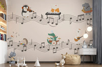 Penguin with earmuffs playing violin beside a polar bear at the piano on a peach wall mural., GD10206