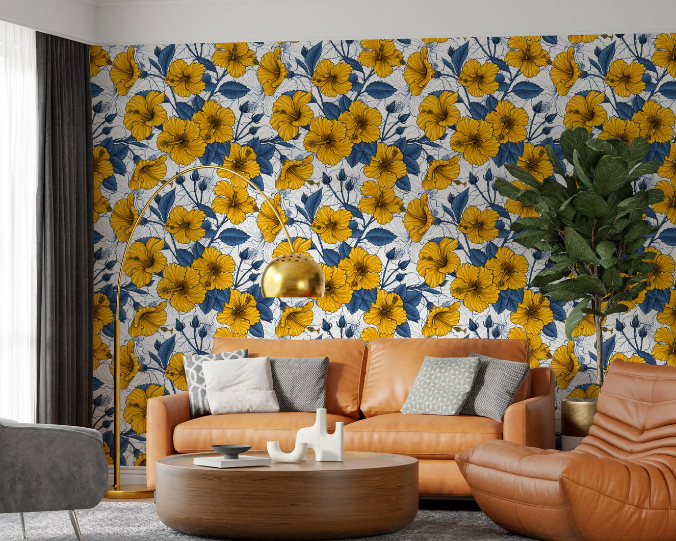 Yellow hibiscus wallpaper set on a living room feature wall with blue leaves.