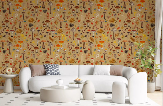 Ochre woodland mushroom wallpaper styled on a living room wall.