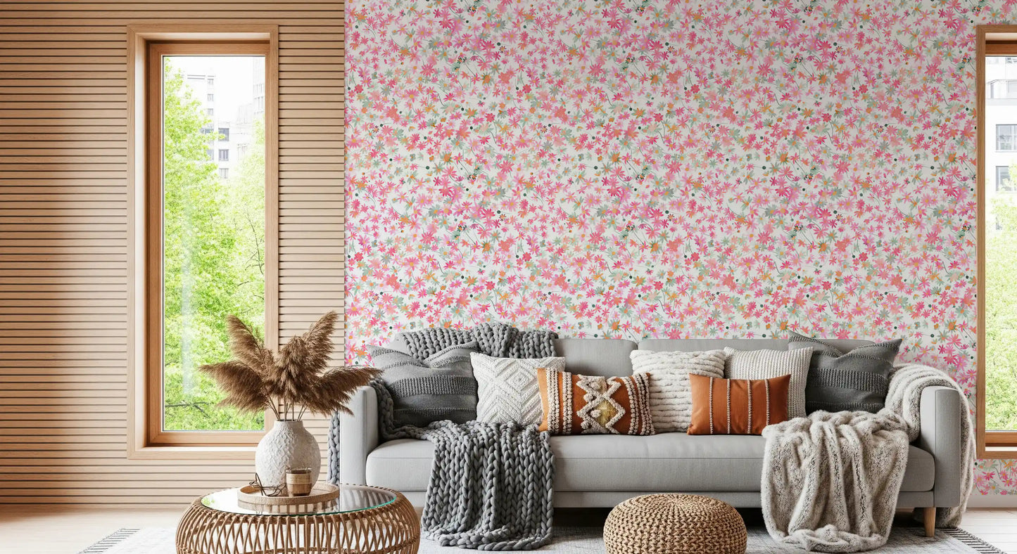 Floral wallpaper showing small daisies in dusty rose, peach, and pink watercolour tones., GD10217