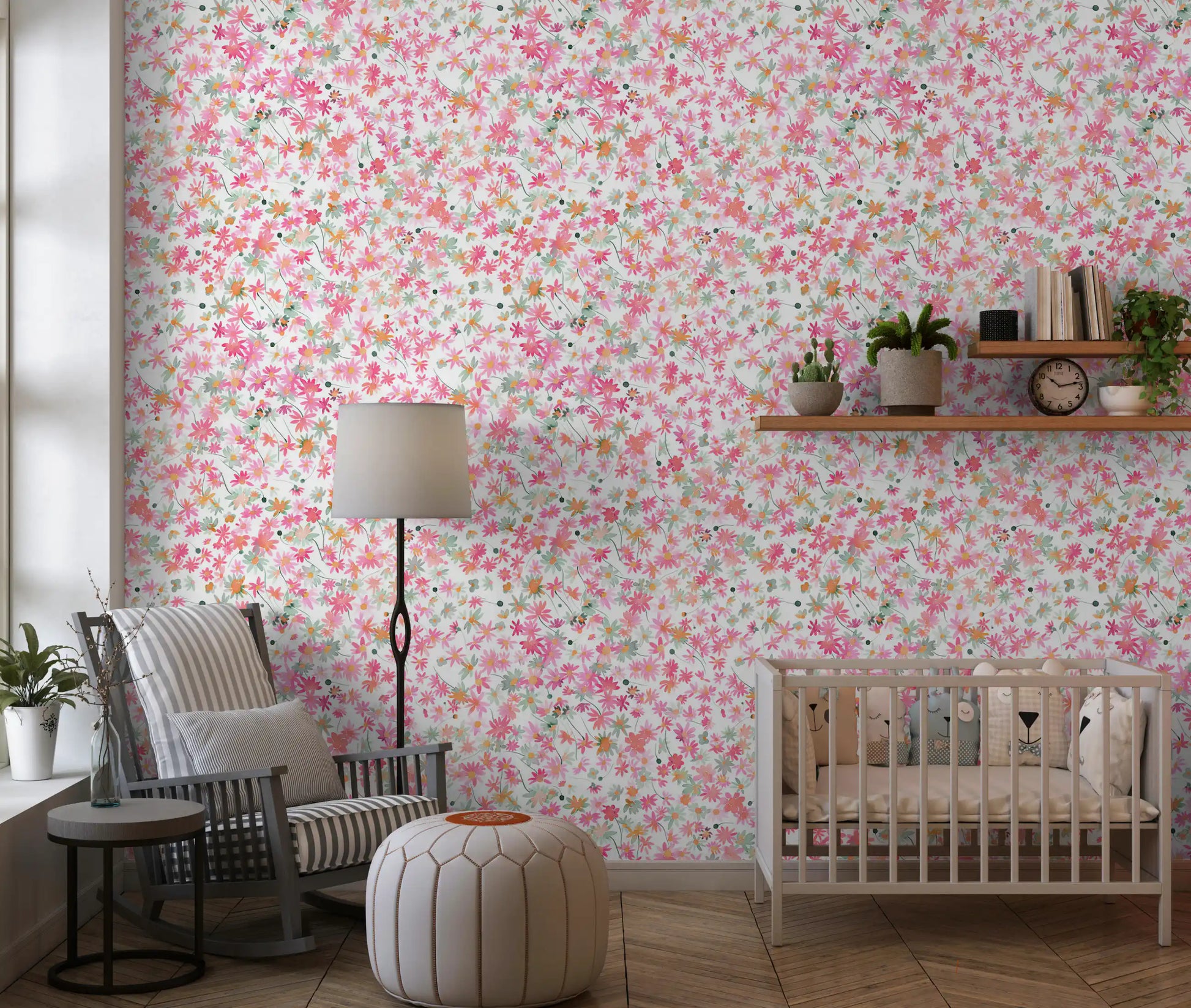 Nursery wall featuring a soft daisy wallpaper in pink, coral, and peach tones., GD10217