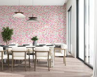 Dining rom wall featuring a pink and coral daisy wallpaper with sage leaves., GD10217