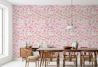 Pink and coral daisy wallpaper with sage leaves and tiny seed dots in a loose pattern., GD10217