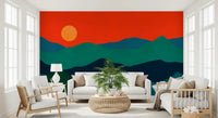 Rounded mountain silhouettes wall mural with a soft orange sun in living area., GD10252