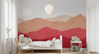 Red and beige layered mountain Horizon wall mural in bright bedroom., GD10253
