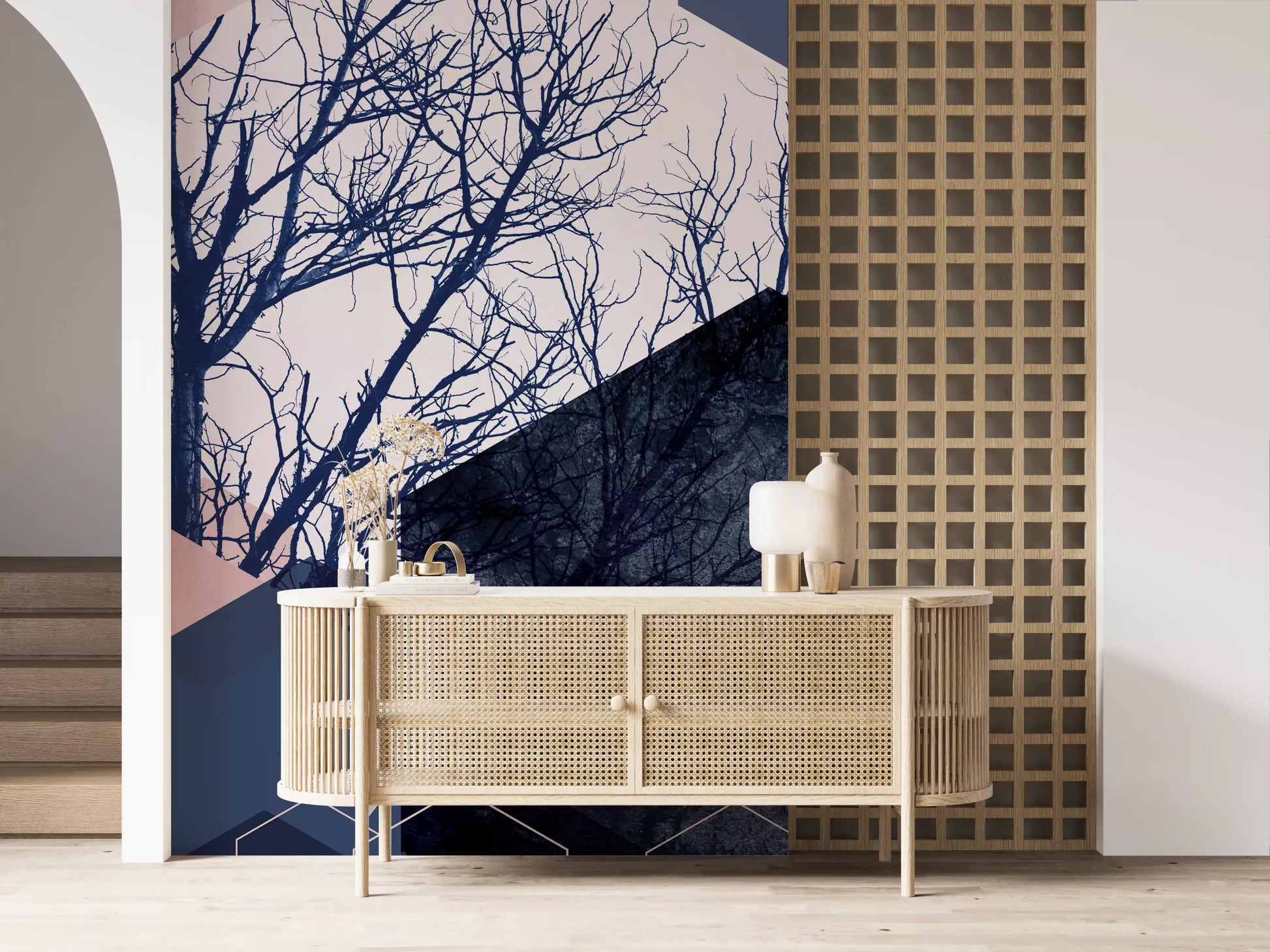 Bare tree branches mural in midnight navy crossed by floating hexagons in blush, teal, and cream., GD10287