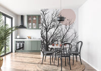Charcoal tree silhouette wall mural with a small blush circle in the upper corner., GD10289
