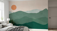Painterly green mountain wall mural with a small orange sun and sky in bedroom., GD10292