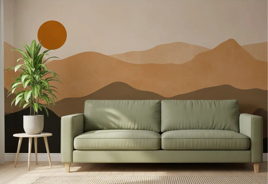 Living room wall styled with earthy mountain sunset mural in warm tan and brown. 