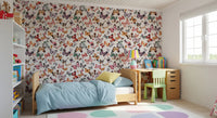 Flying butterflies wallpaper in a kids bedroom with cream walls., GD10338