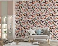 Teal green and coral red butterflies on soft cream wallpaper in nursery., GD10338