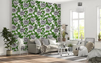 Repeating monochrome rose pattern with layered green leaves wallpaper in living room., GD10398