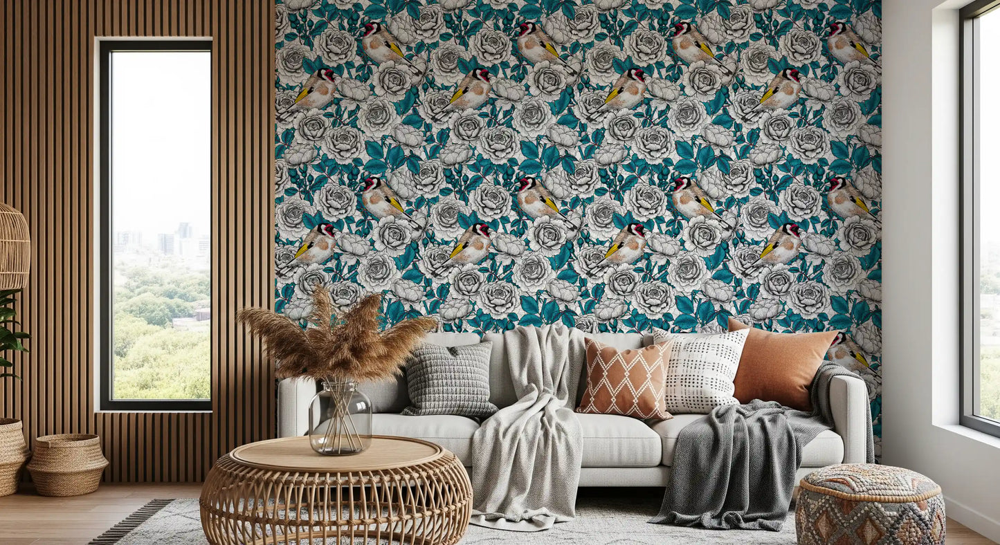 Bold teal botanical foliage wallpaper with red-brown stems in living room.