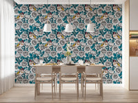 Goldfinch and teal rose garden wallpaper displayed in a dining room setting.