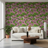 European goldfinch bird wallpaper with red face patch perched among pink rose blooms., GD10402