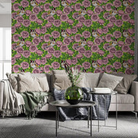 Goldfinch wallpaper with brown and white plumage nestled among pink flowers and green leaves., GD10402