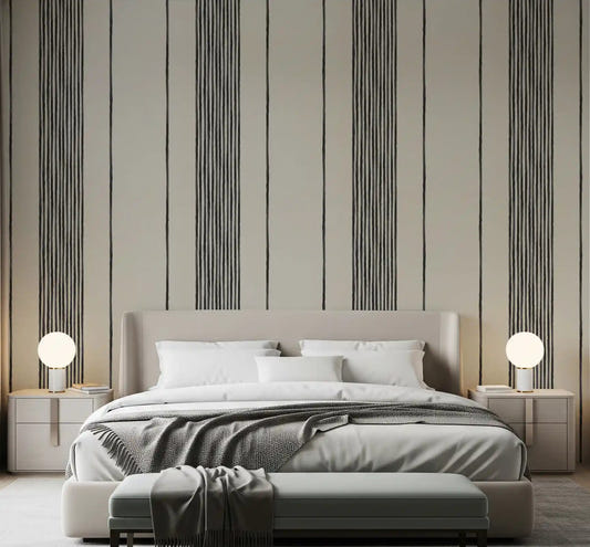 Beige and charcoal striped wallpaper applied in a bedroom space.