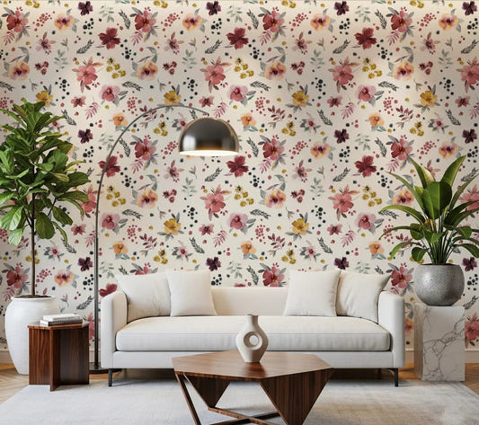 Watercolor botanical wallpaper shown in a warm living room with navy blue buds.