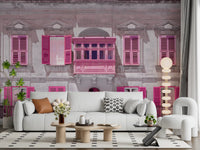 Symmetrical dwelling mural with magenta doorway and limestone wall texture., GD10419