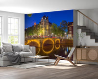 Twilight canal mural with glowing bridge arches reflected on still water., GD10420