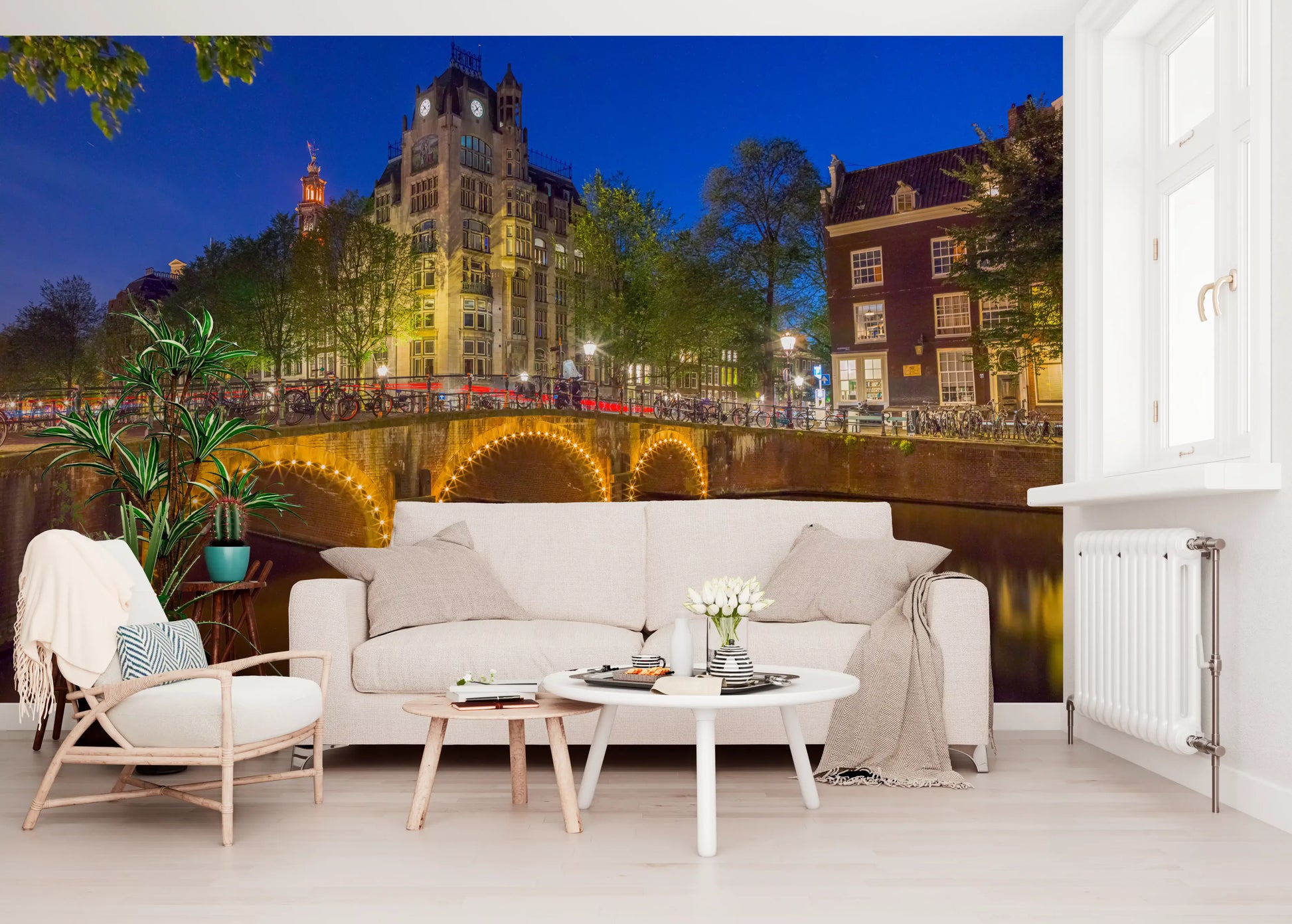 Urban waterfront wall mural with brick townhouses and leafy green trees., GD10420