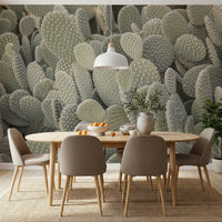Sage green cacti mural with layered organic shapes and subtle shadowing in dining room., GD10421