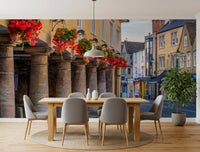 Village Blooms and Stone Archway wall mural displayed in a dining room., GD10427