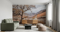 Gravel pathway wall mural with golden-orange foliage and fence posts., GD10430
