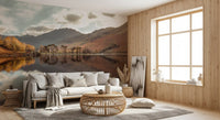 Sunlight through scattered clouds above mountain peaks in a lake mural., GD10435