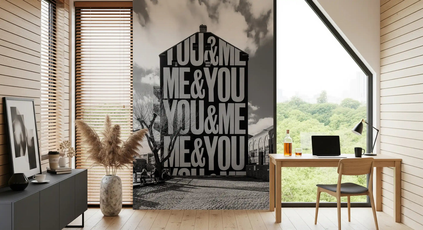 Black and white typographic wall mural featuring stacked letterforms., GD10449
