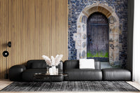 Gothic pointed arch wall mural with dark flint and pale stonework., GD10450